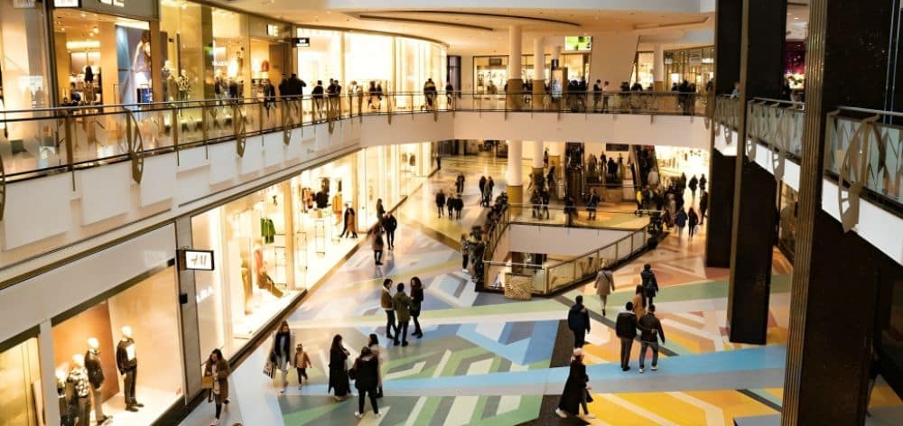 beneficios vivir cerca centro comercial